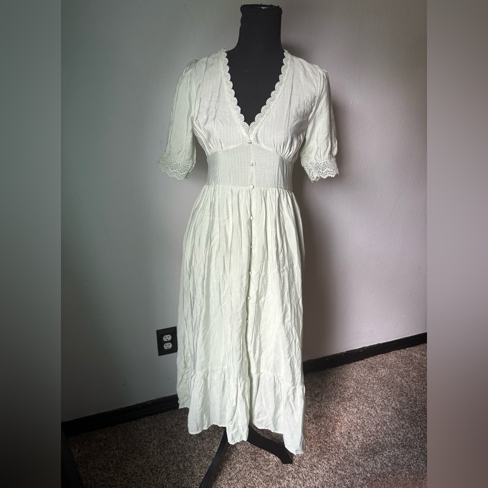 Elegant Cream Lace-Trimmed Dress